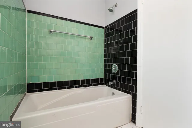 a bathroom with a bathtub