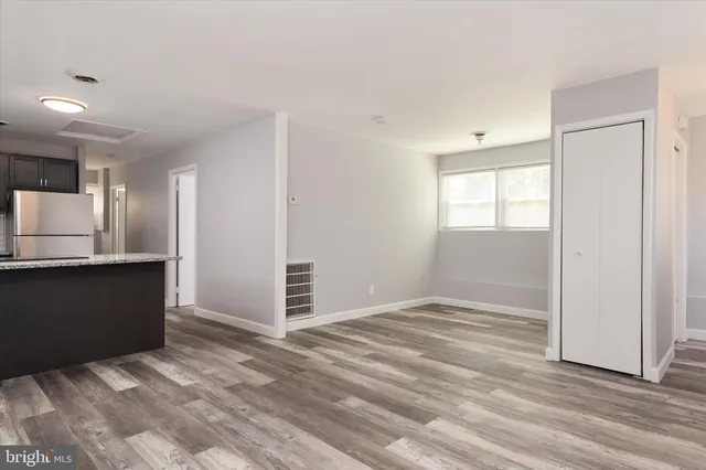 an empty room with windows