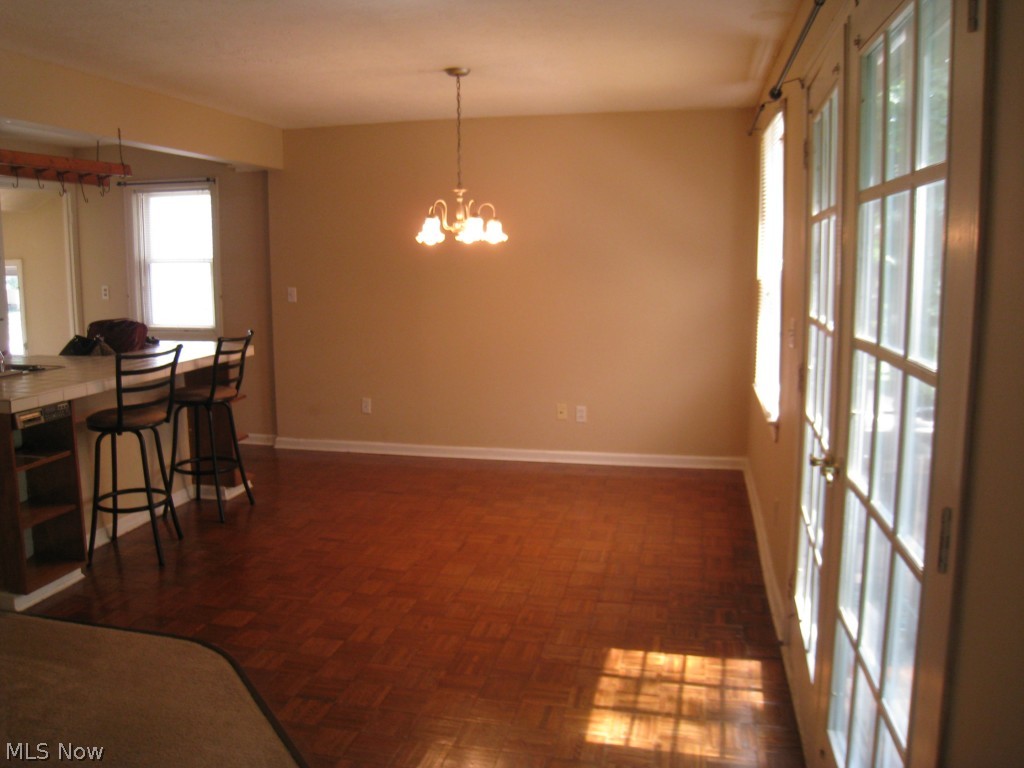 4674 Liberty Road South Euclid, OH 44121 - Photo 4 of 18 View of the dining room and kitchen breakfast bar.