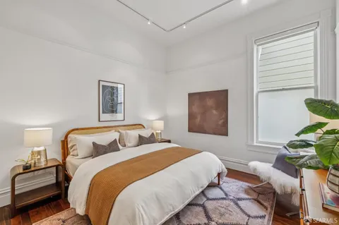 a view of front door and bedroom