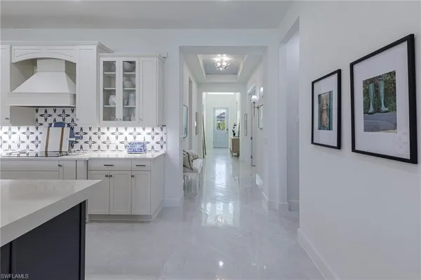 a view of a livingroom and a bathroom