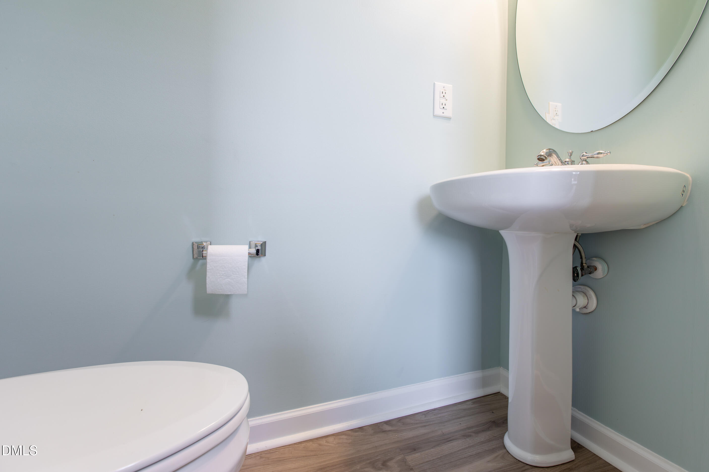 8006 Morrell Lane Durham, NC 27713 - Photo 11 of 38 a bathroom with a sink toilet and mirror