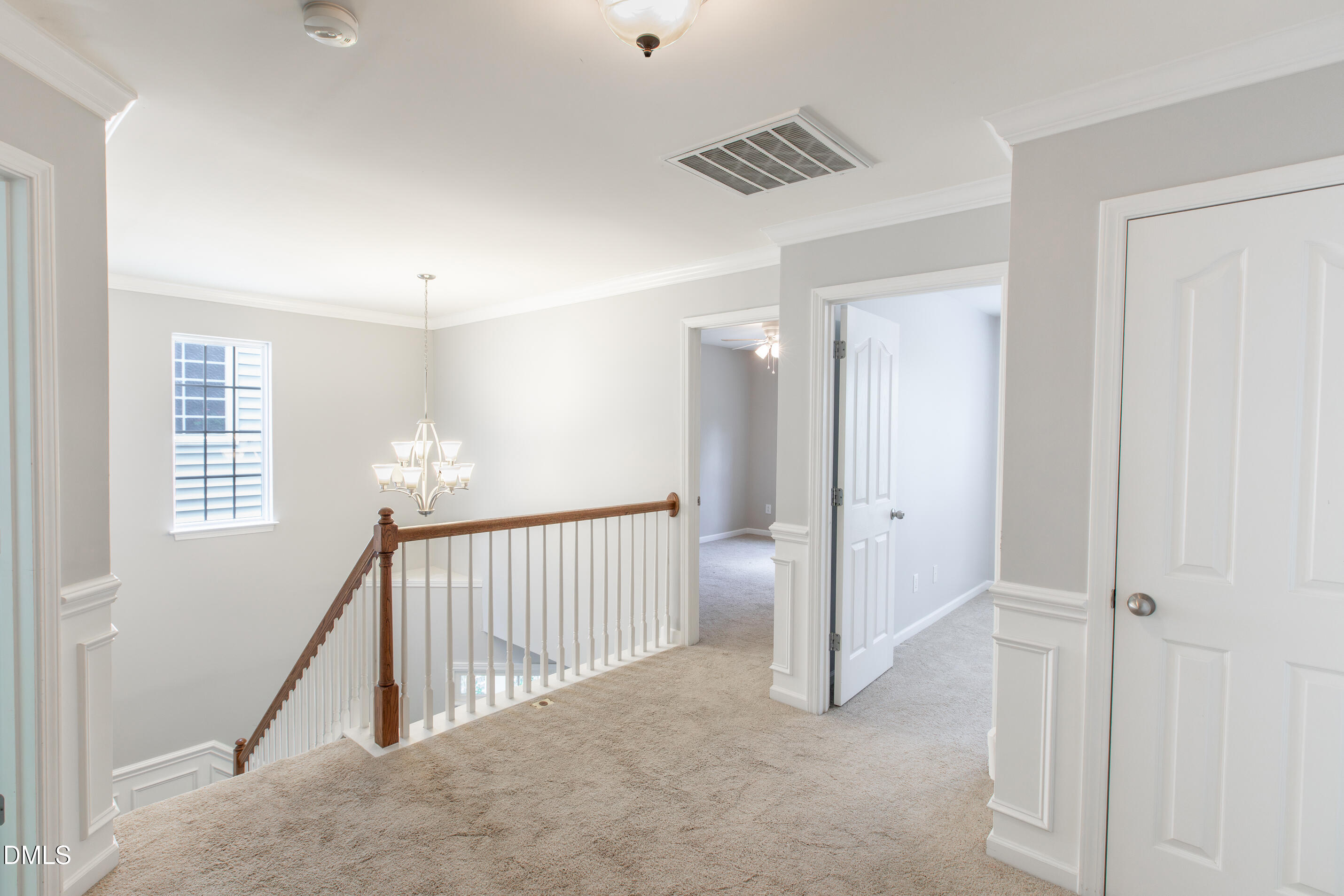 8006 Morrell Lane Durham, NC 27713 - Photo 22 of 38 a view of a hallway with interior of the house