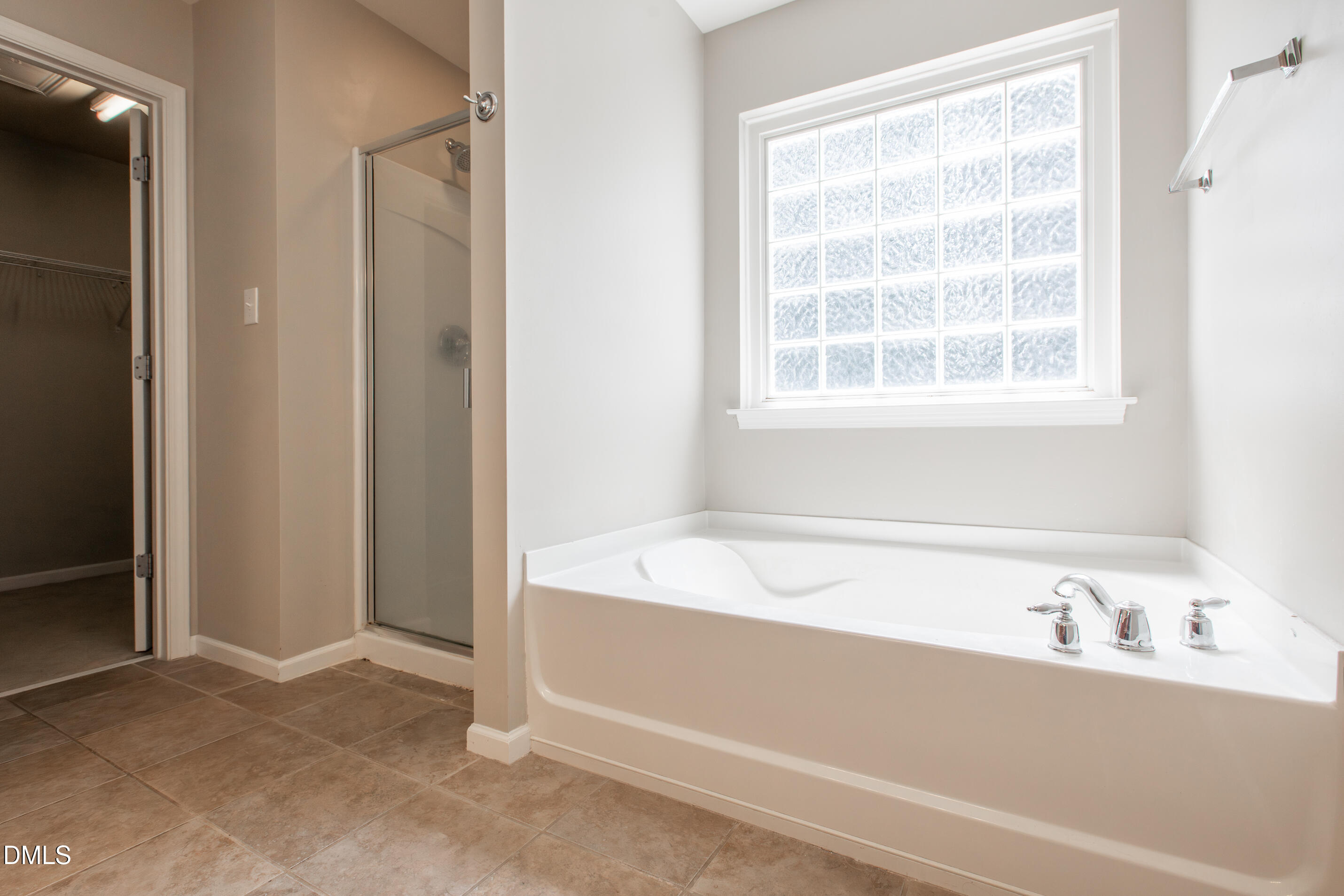 8006 Morrell Lane Durham, NC 27713 - Photo 26 of 38 a bath tub sitting next to a window
