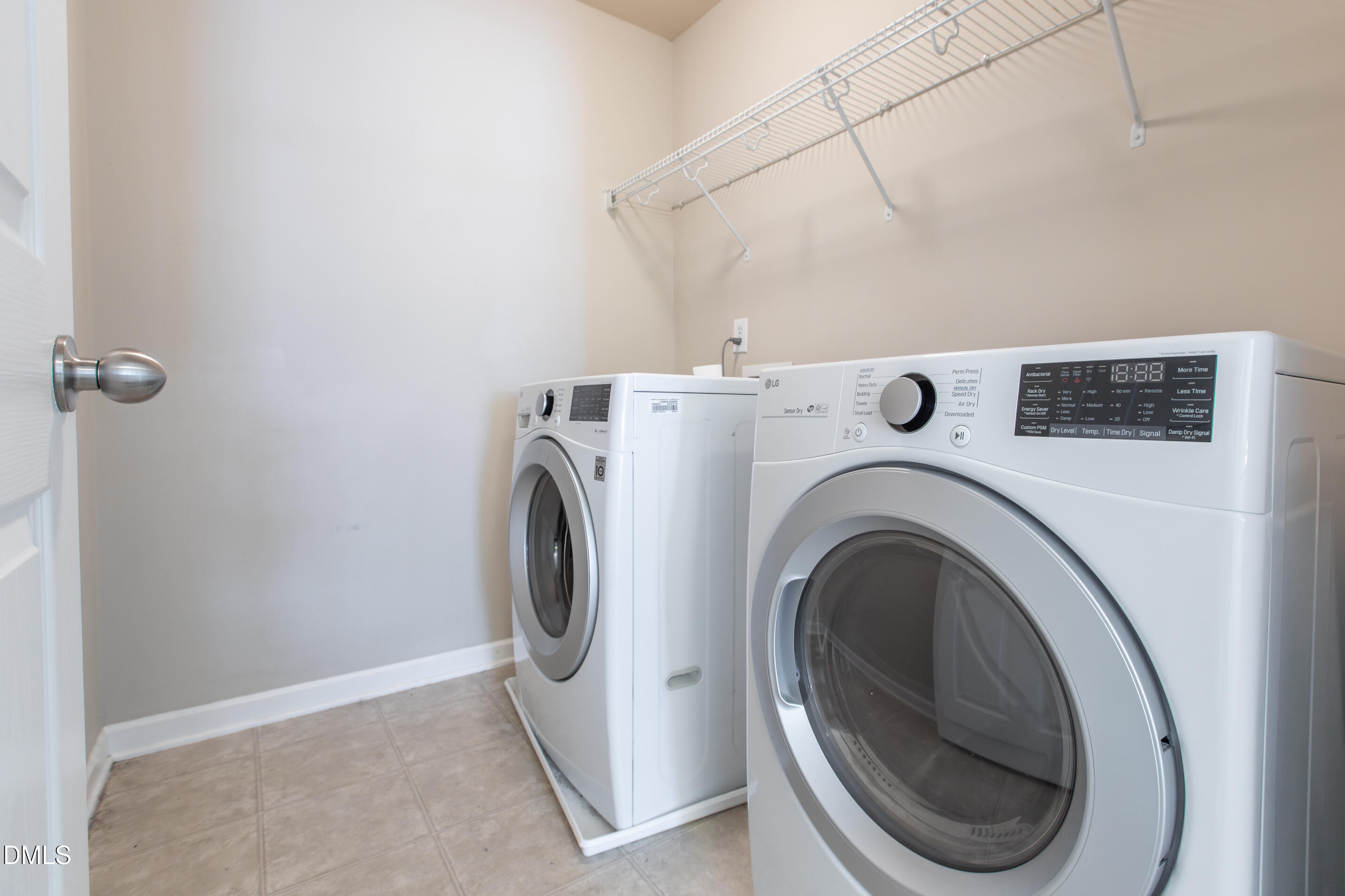 8006 Morrell Lane Durham, NC 27713 - Photo 30 of 38 a utility room with dryer and washer