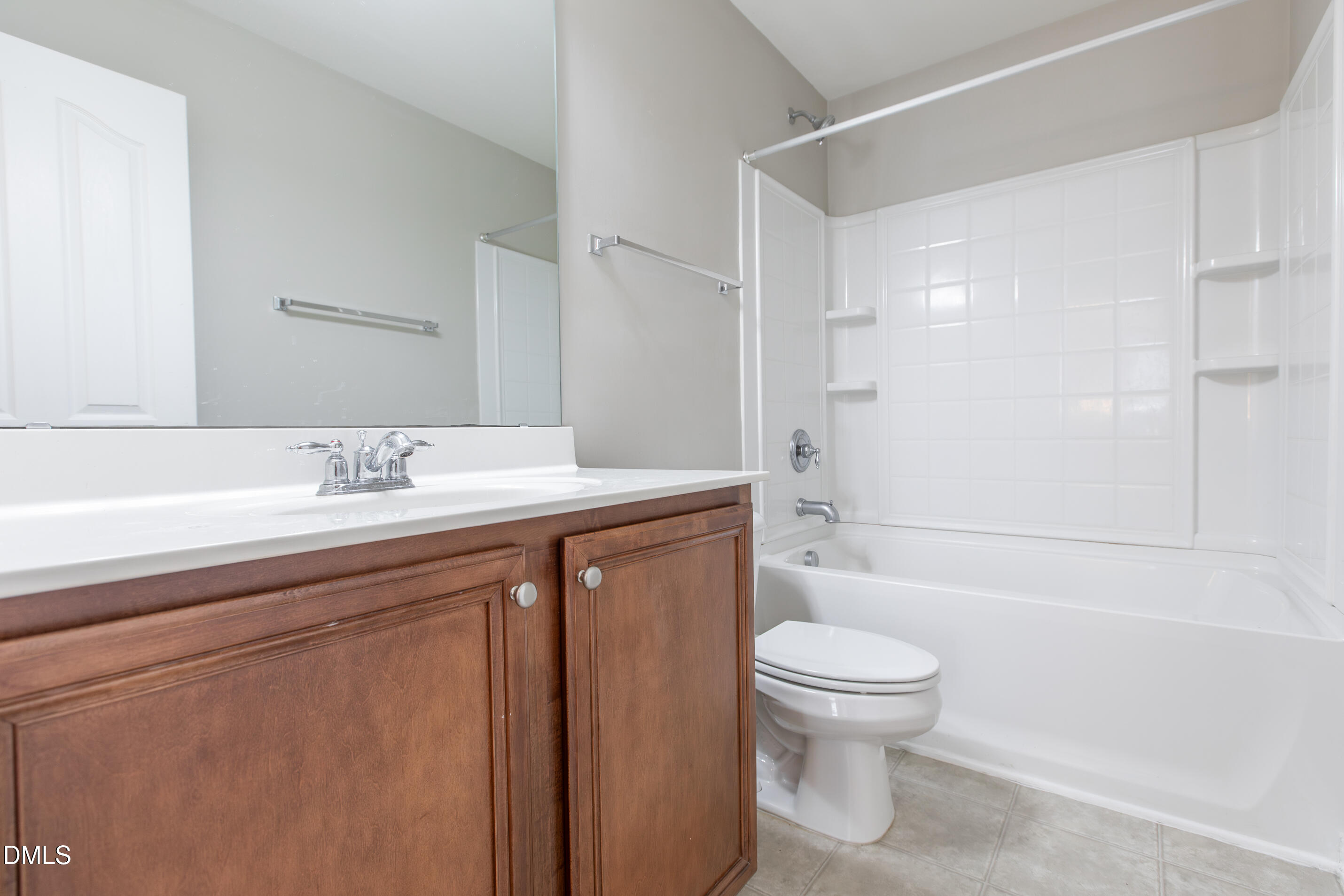 8006 Morrell Lane Durham, NC 27713 - Photo 31 of 38 a bathroom with a sink a toilet and shower