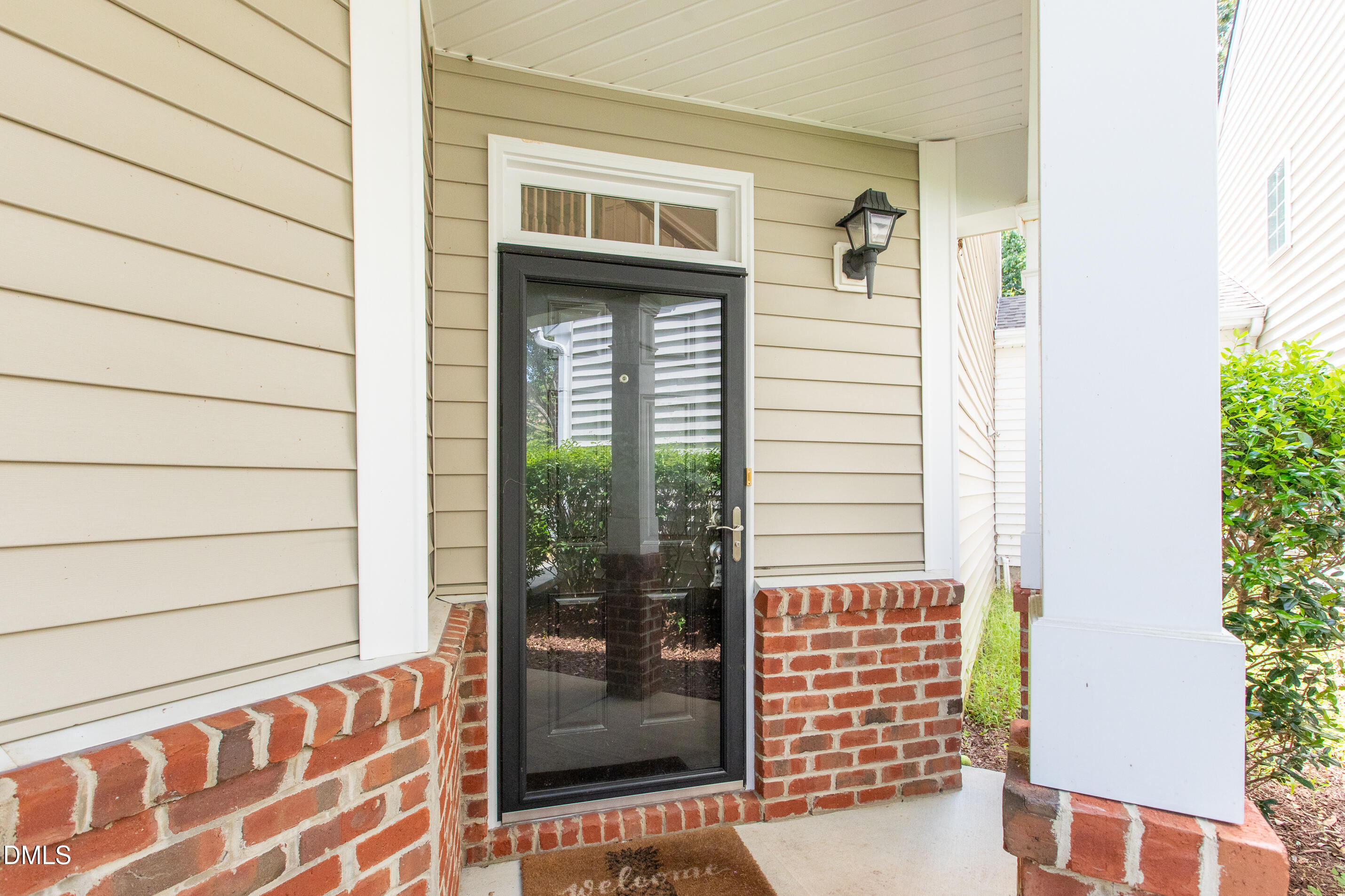 8006 Morrell Lane Durham, NC 27713 - Photo 4 of 38 a front view of a house with a entrance