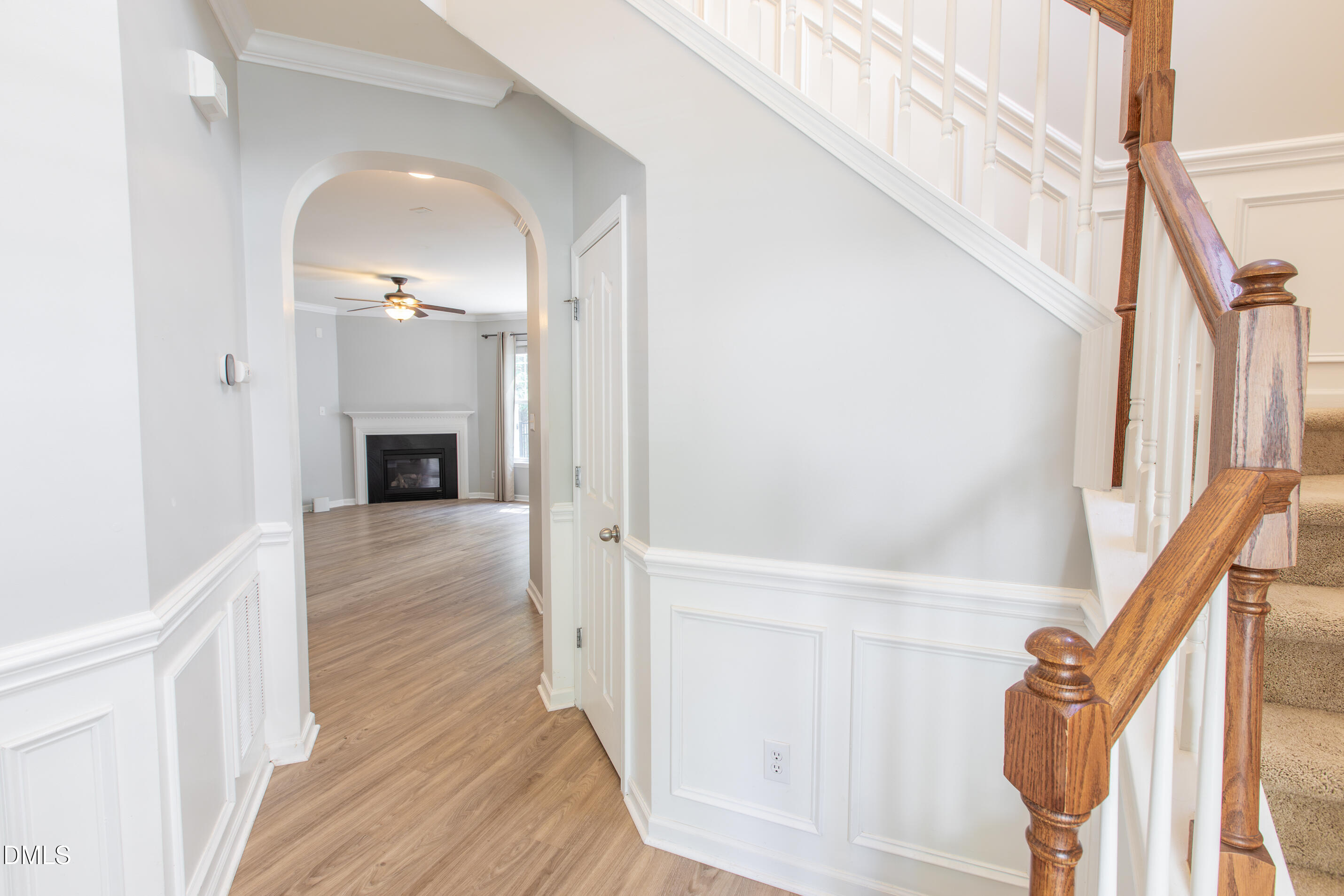 8006 Morrell Lane Durham, NC 27713 - Photo 7 of 38 a view of main area and entryway with wooden floor