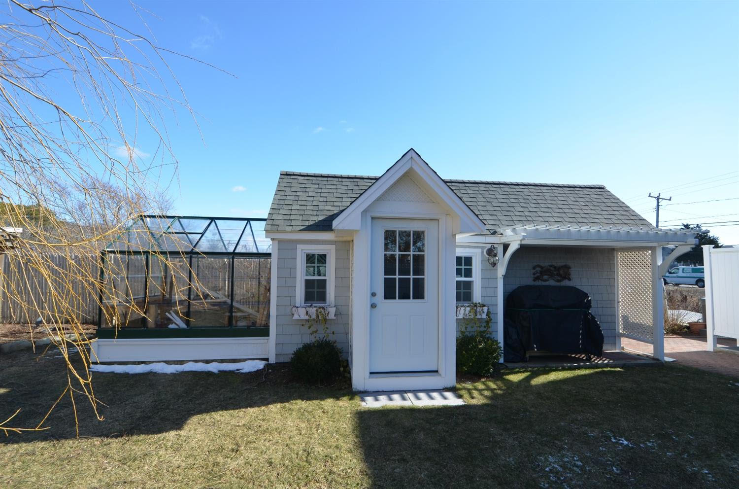 162 Lower County Road West Dennis, MA 02670 - Photo 24 of 27 a front view of a house with a yard