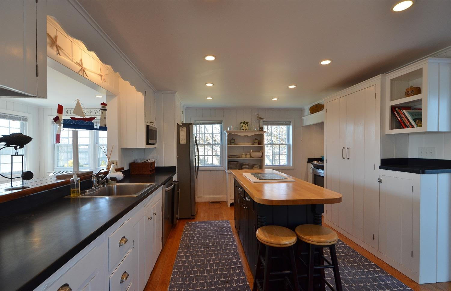 162 Lower County Road West Dennis, MA 02670 - Photo 3 of 27 a room with furniture and a window