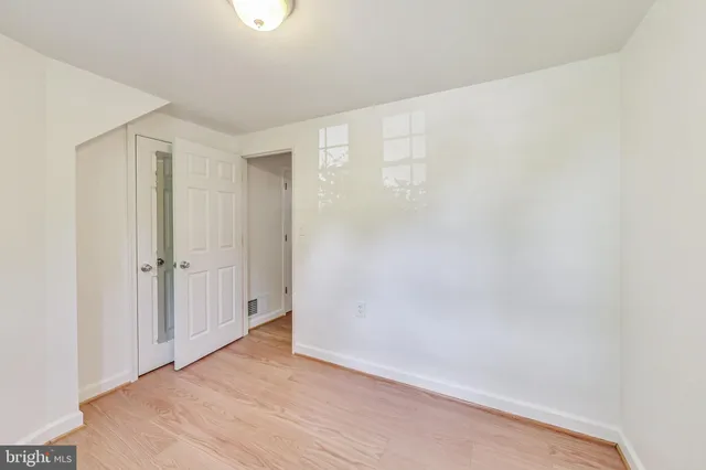 a bathroom with a toilet a sink and shower