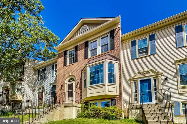 a view of a porch with a floor to ceiling window