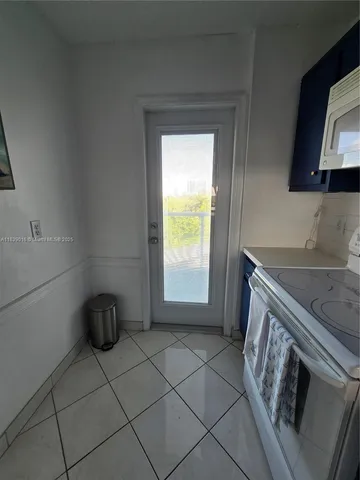 a bedroom with a bed and walk in closet