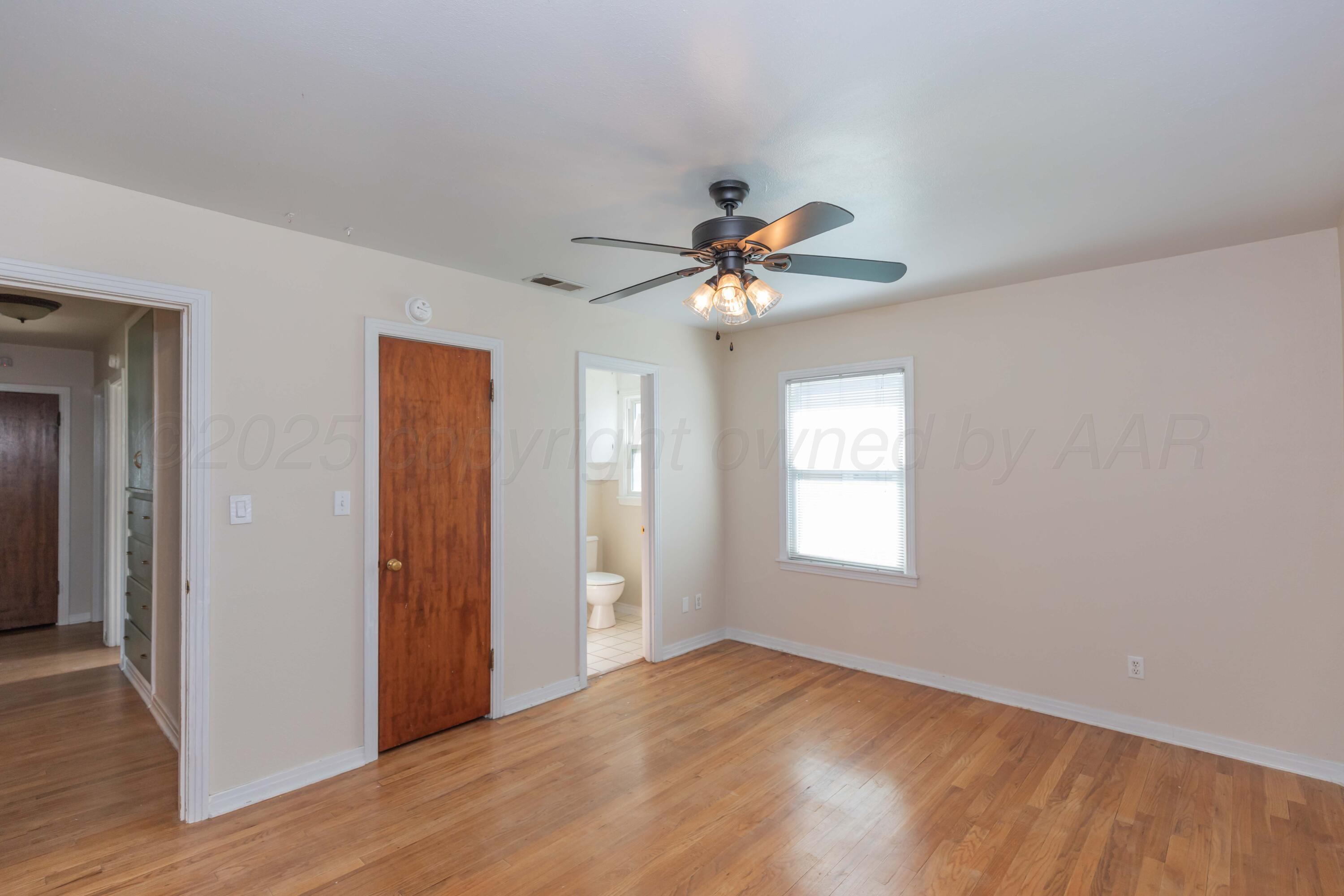3513 Concord Road Amarillo, TX 79109 - Photo 18 of 45 a view of an empty room with a window