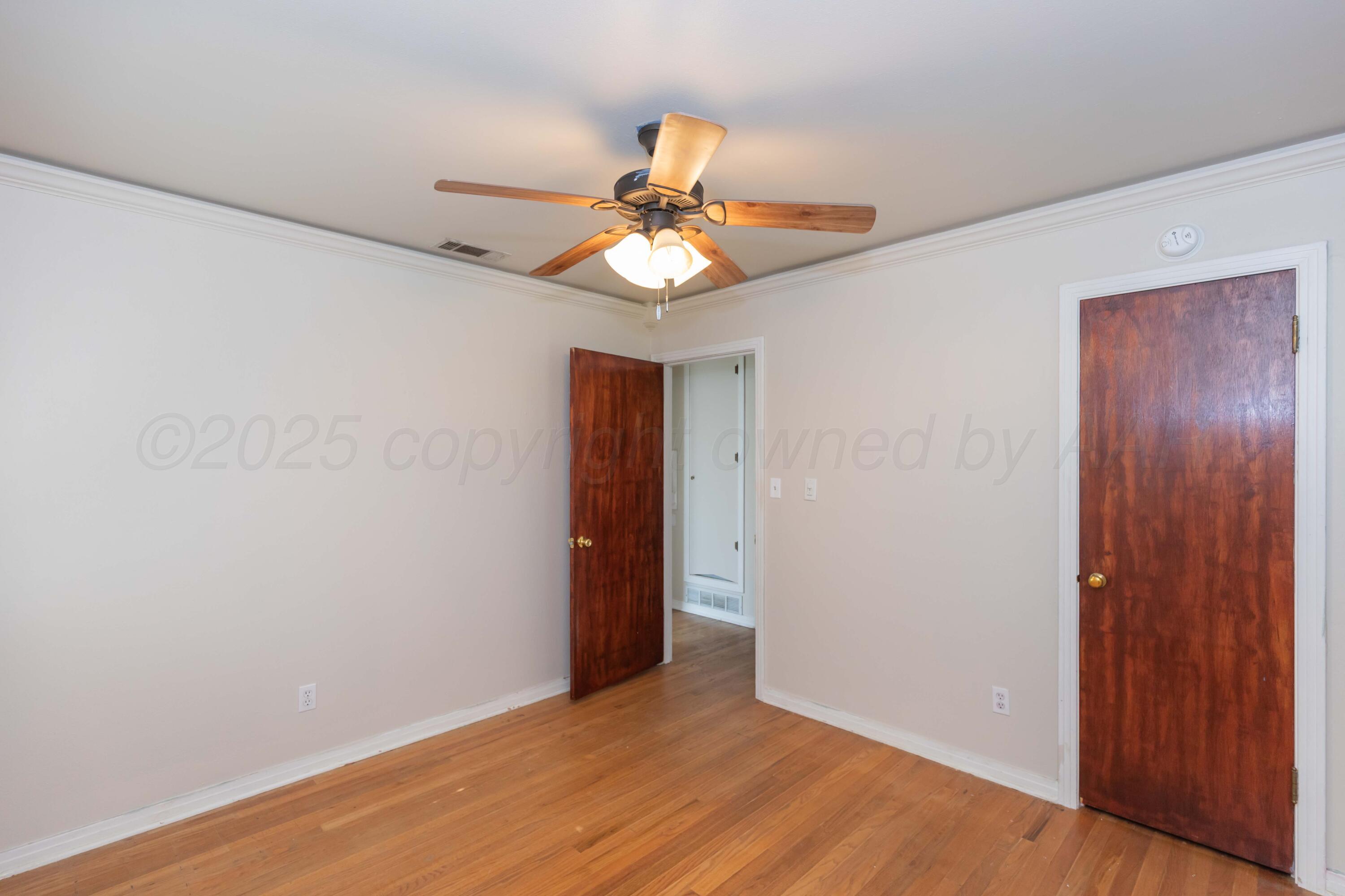 3513 Concord Road Amarillo, TX 79109 - Photo 27 of 45 a view of empty room with wooden floor