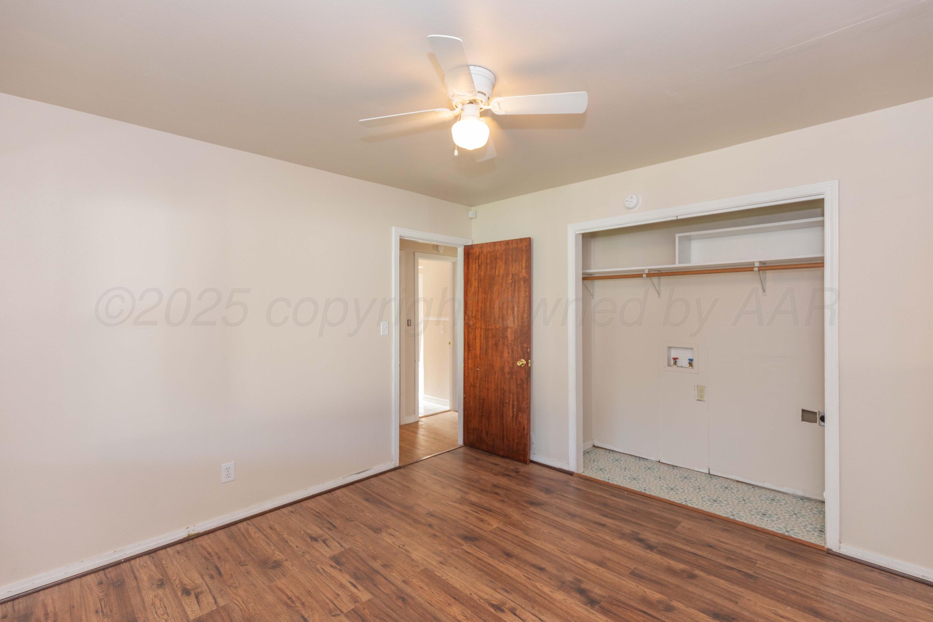 3513 Concord Road Amarillo, TX 79109 - Photo 33 of 45 a view of an empty room with wooden floor