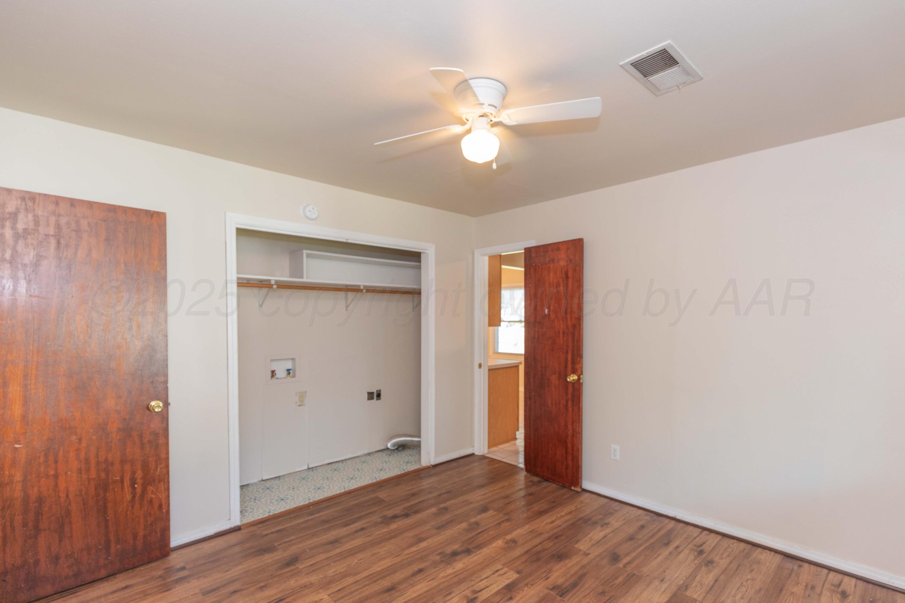 3513 Concord Road Amarillo, TX 79109 - Photo 34 of 45 a view of an empty room with wooden floor