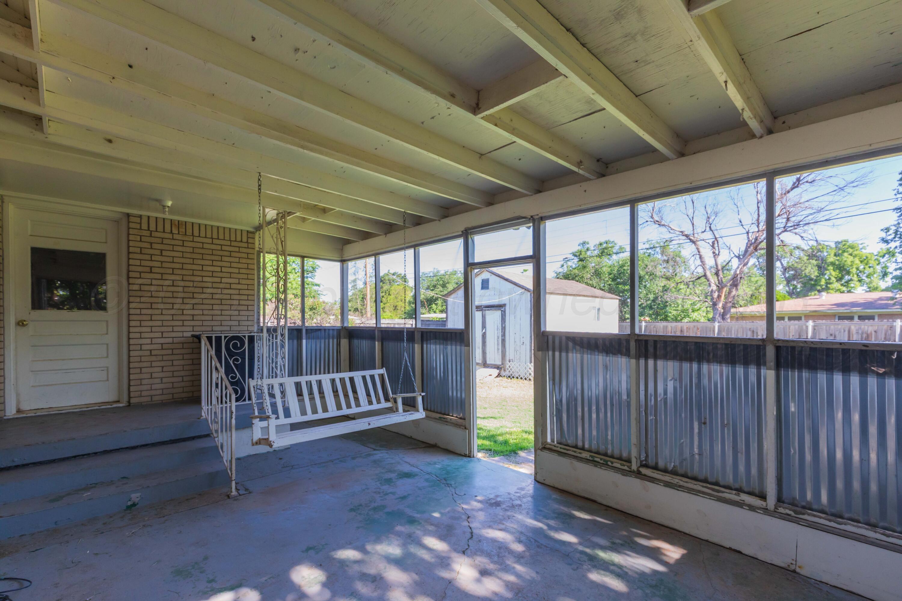 3513 Concord Road Amarillo, TX 79109 - Photo 39 of 45 a view of a porch with wooden fence