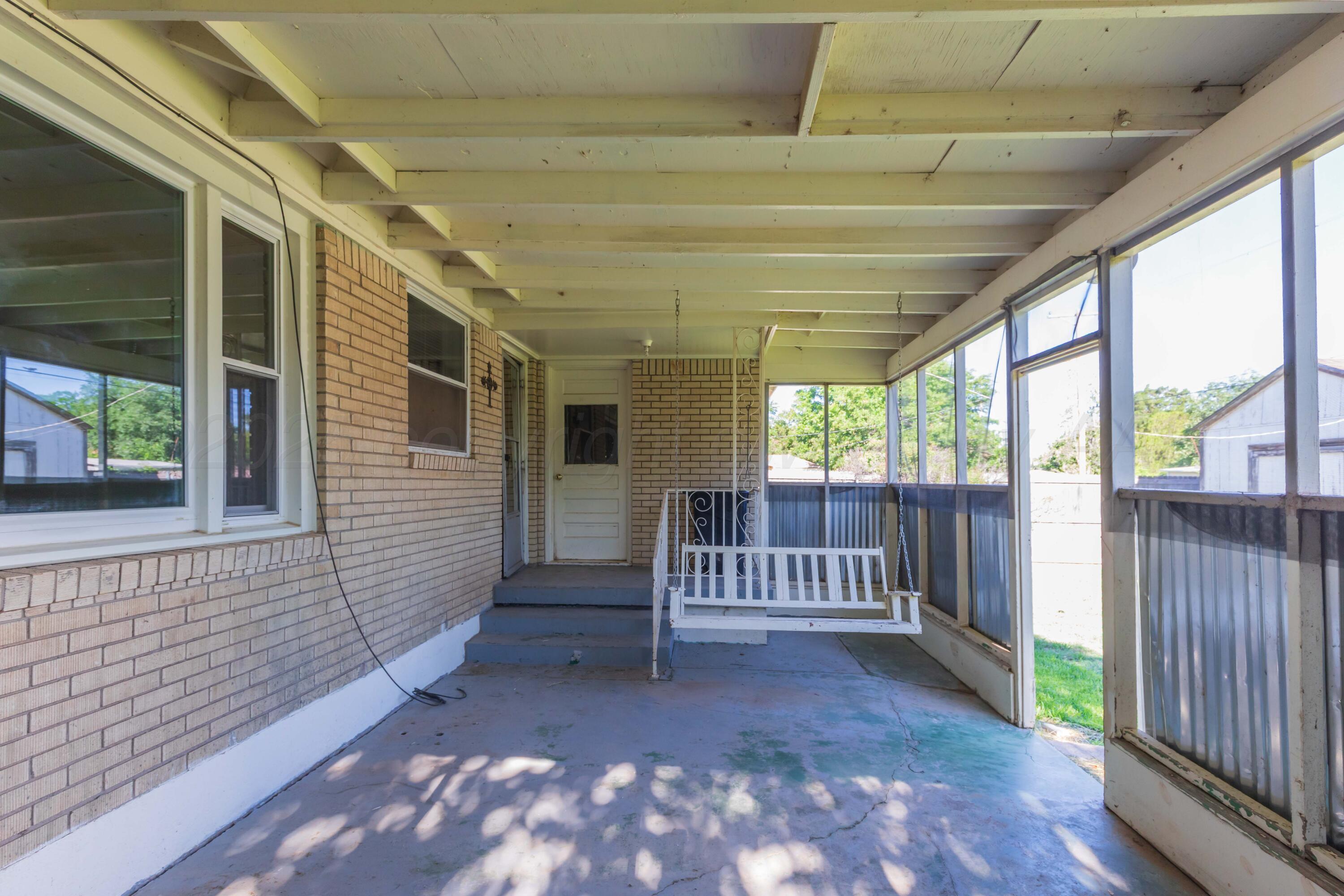 3513 Concord Road Amarillo, TX 79109 - Photo 40 of 45 a view of a porch with wooden fence