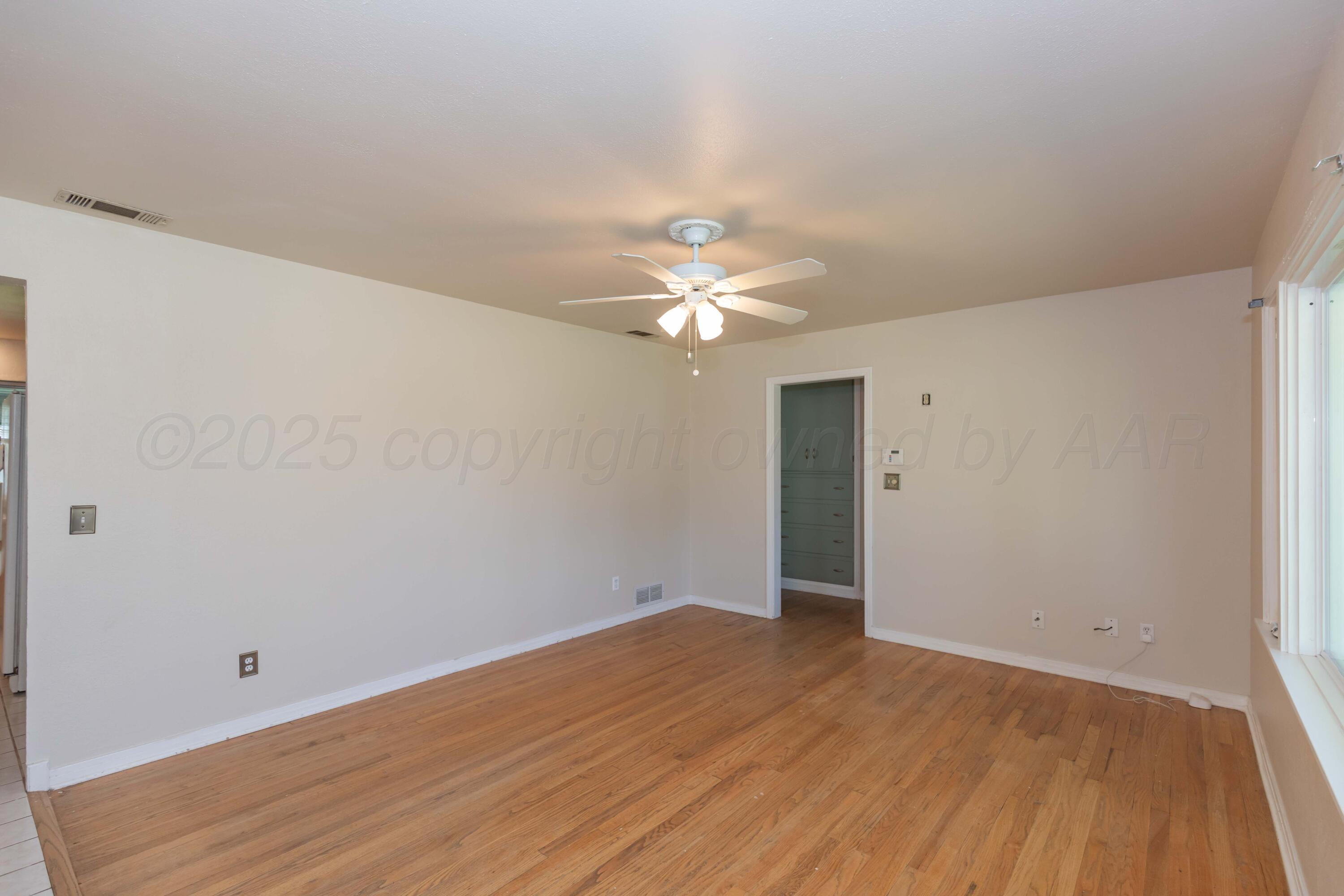 3513 Concord Road Amarillo, TX 79109 - Photo 4 of 45 wooden floor in an empty room