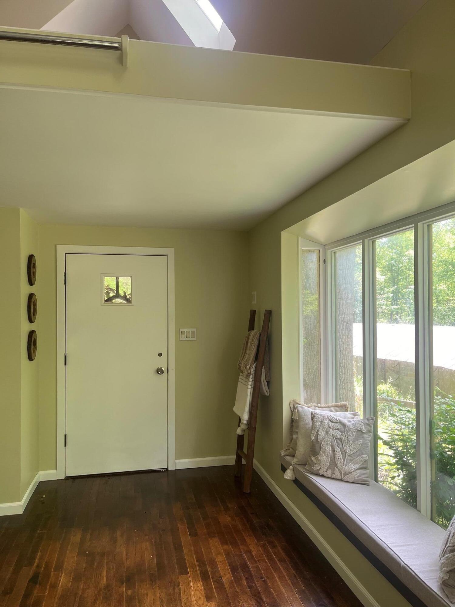 9737 Pine Forest Road Northeast Copper Hill, VA 24079 - Photo 14 of 41 a view of a room with gym equipment and a large window