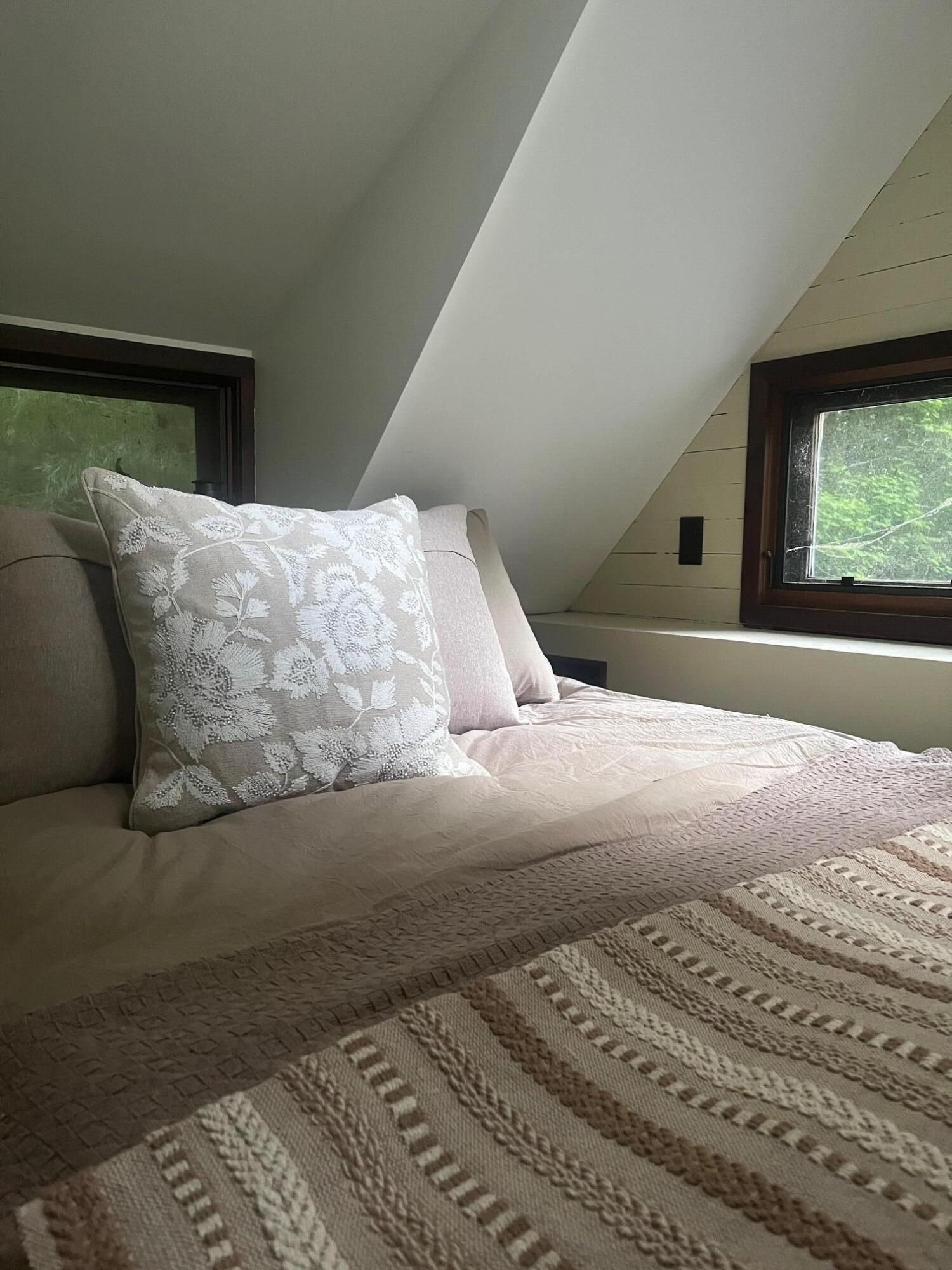 9737 Pine Forest Road Northeast Copper Hill, VA 24079 - Photo 38 of 41 a bedroom with a bed and a window