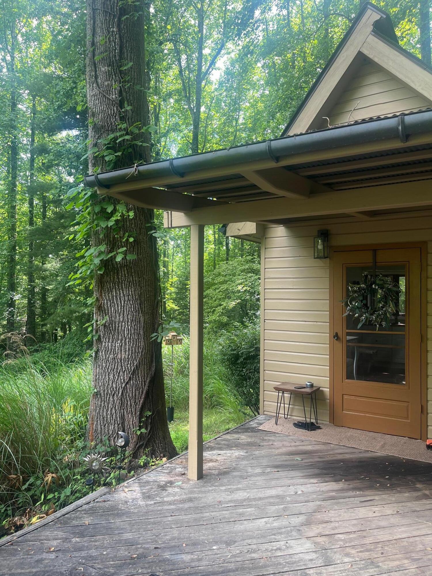 9737 Pine Forest Road Northeast Copper Hill, VA 24079 - Photo 41 of 41 a backyard of a house with seating space