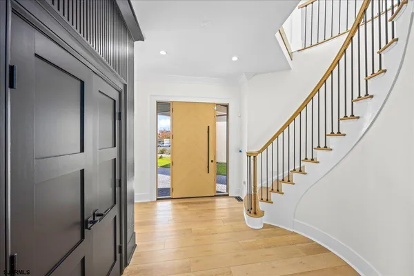 a view of a chairs and table in the balcony