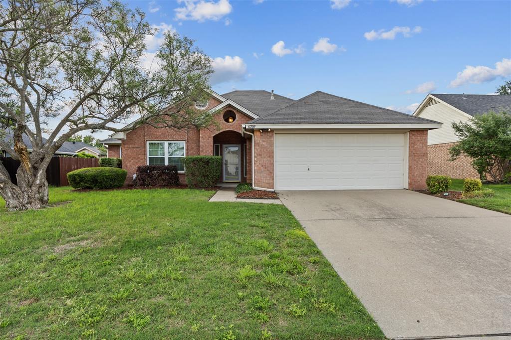6209 Peach Tree Drive Midlothian, TX 76065 - Photo 1 of 1 front view of a house with a yard