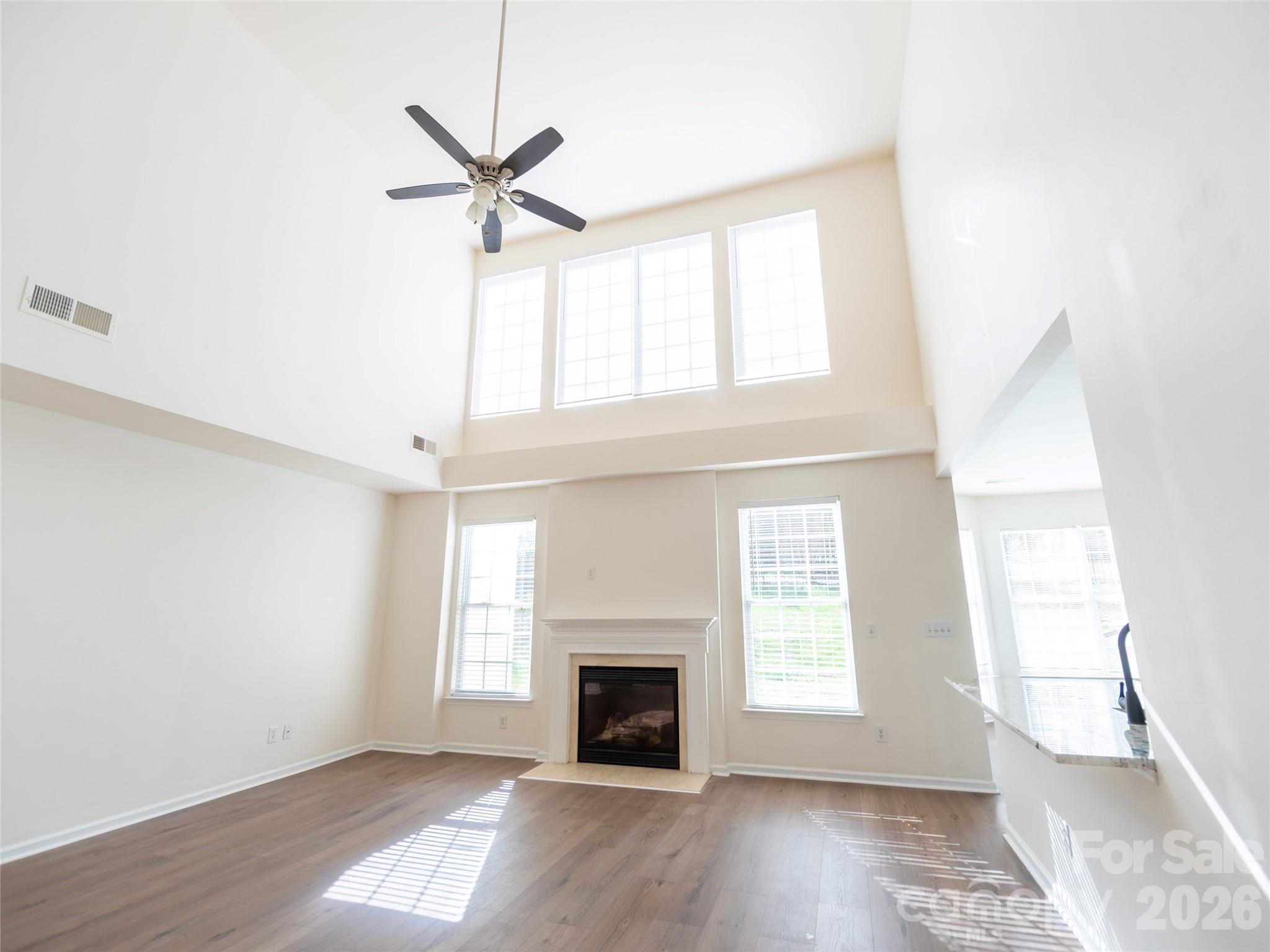 6002 Brook Valley Run Monroe, NC 28110 - Photo 12 of 32 a view of a livingroom with a window and fireplace
