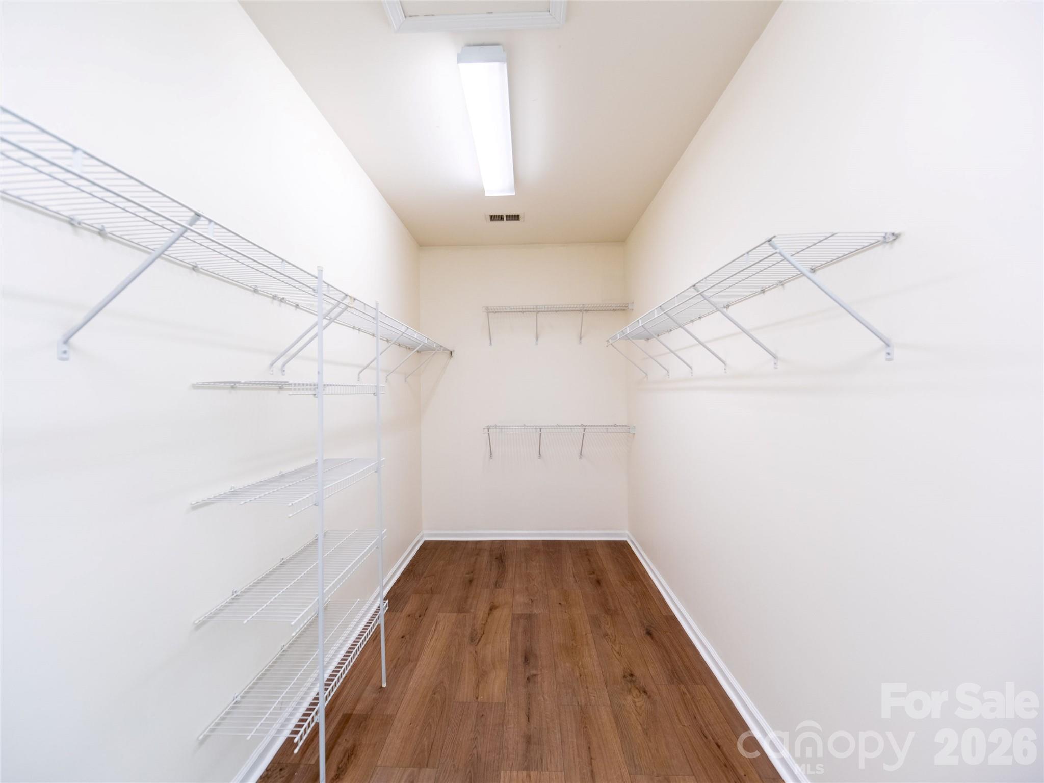 6002 Brook Valley Run Monroe, NC 28110 - Photo 15 of 32 a view of a room with wooden floor