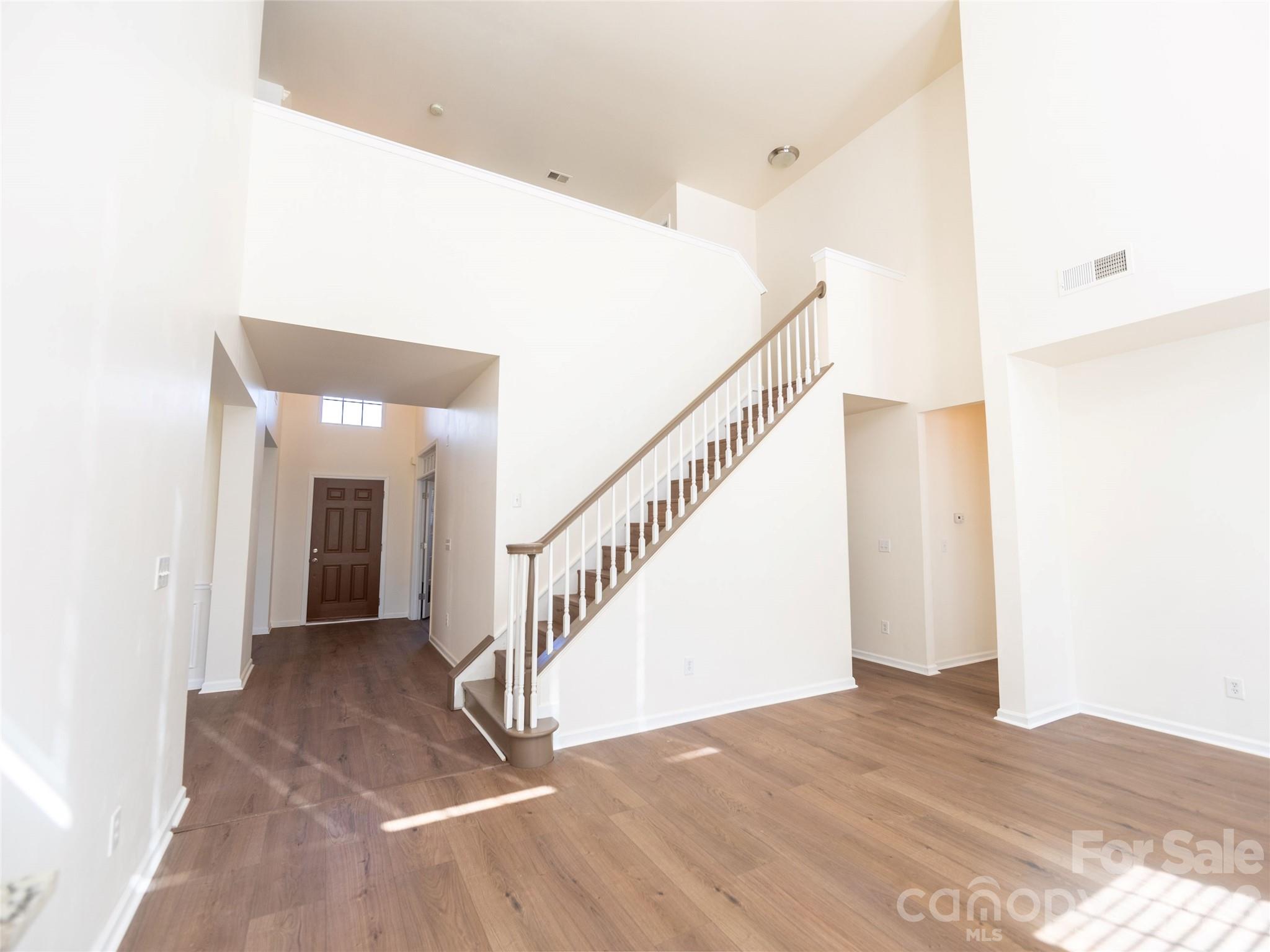 6002 Brook Valley Run Monroe, NC 28110 - Photo 20 of 32 a view of a hallway view with staircase