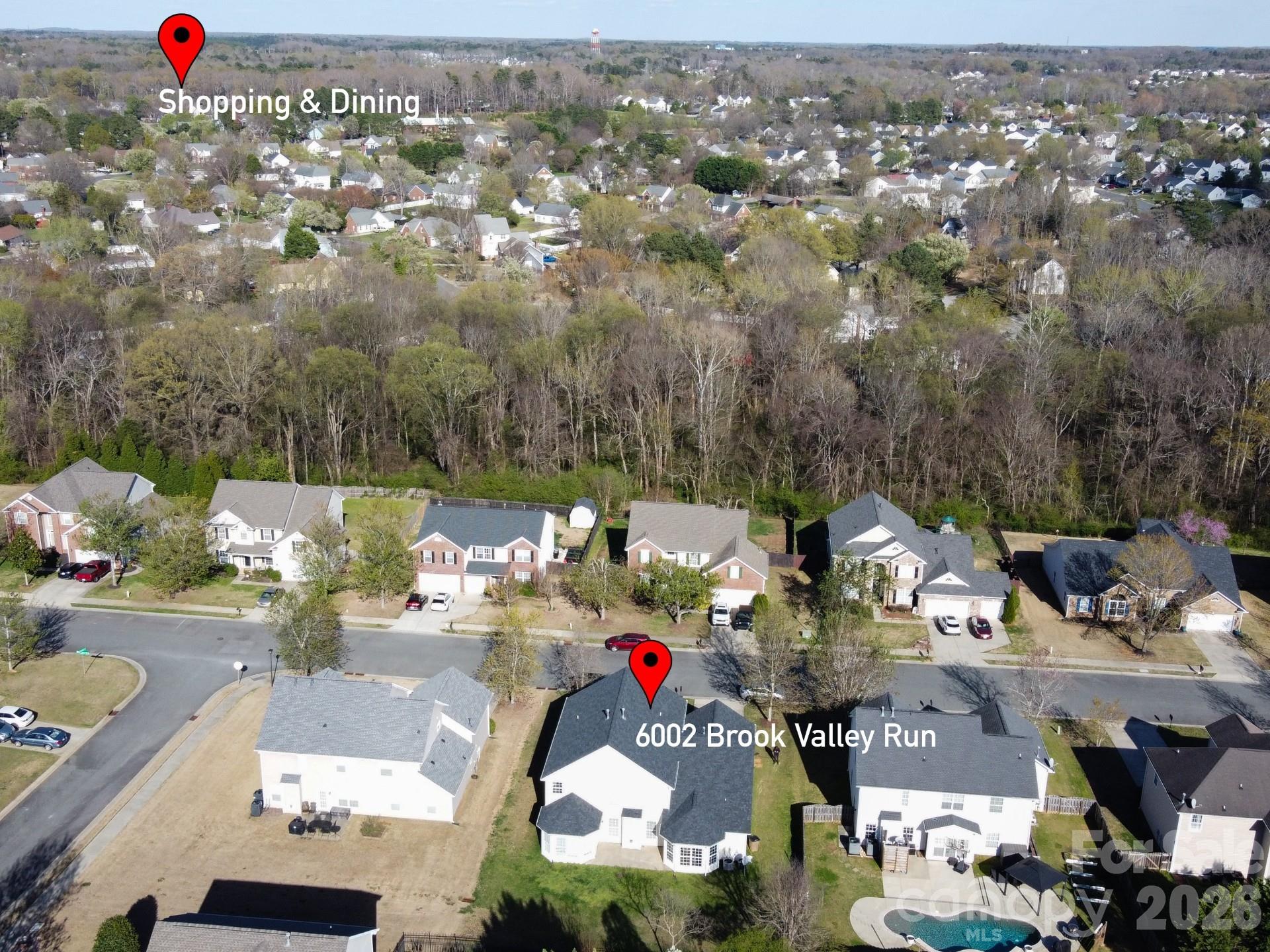 6002 Brook Valley Run Monroe, NC 28110 - Photo 32 of 32 an aerial view of residential houses with outdoor space