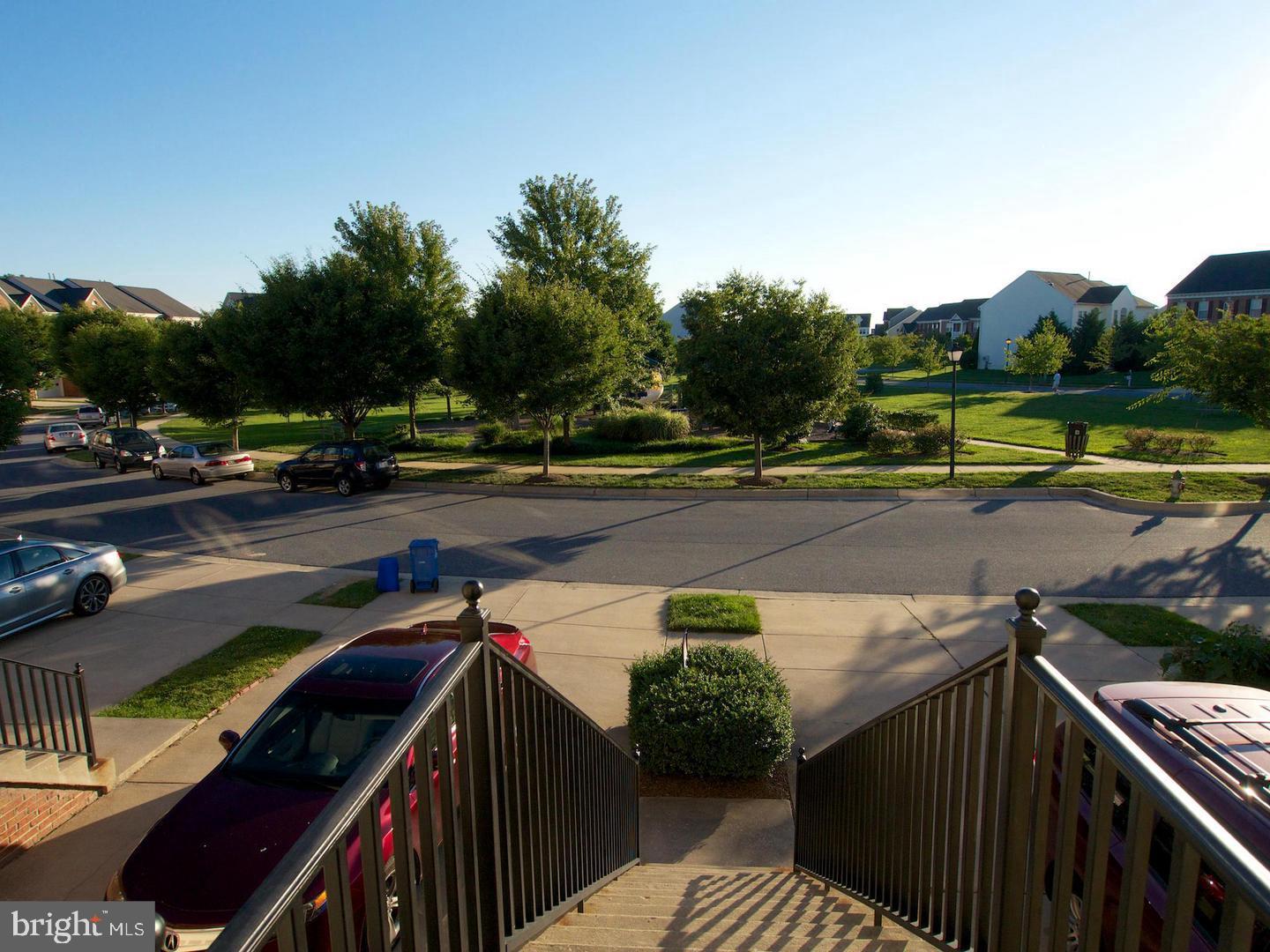 13606 Mills Farm Road Rockville, MD 20850 - Photo 17 of 18 a view of a street with cars on road