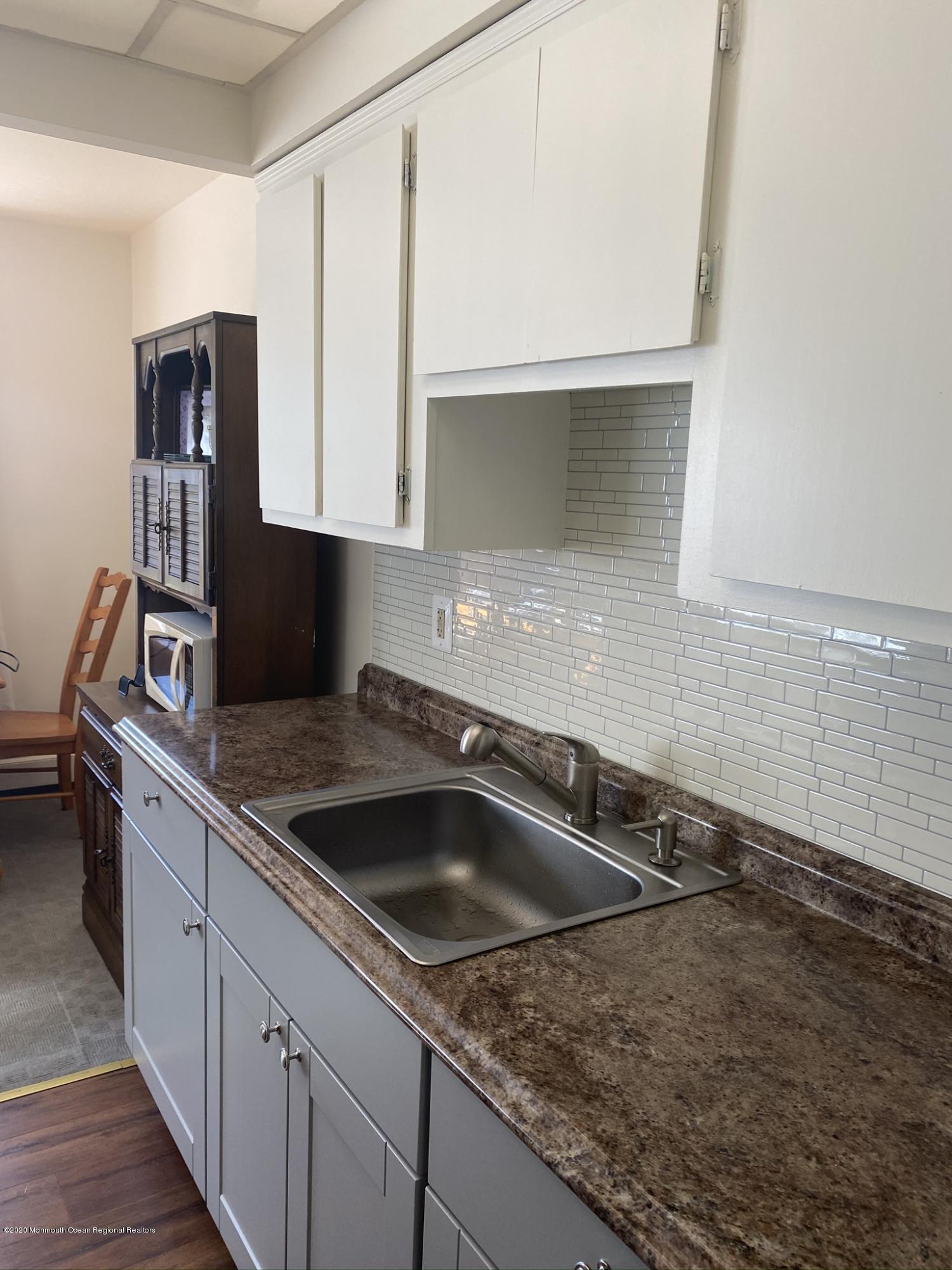 52 Stonehurst Boulevard, Unit B Freehold, NJ 07728 - Photo 4 of 30 IMG_1044