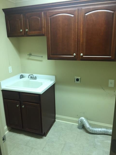 1615 Fair House Road Spring Hill, TN 37174 - Photo 18 of 19 a bathroom with a sink and a mirror
