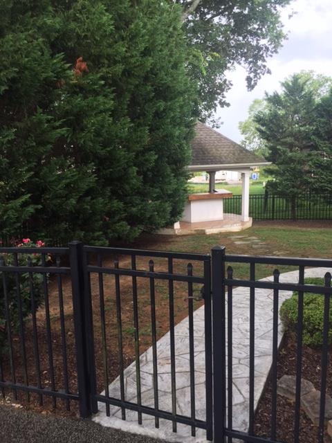 1615 Fair House Road Spring Hill, TN 37174 - Photo 4 of 19 a view of a balcony with wooden floor and fence