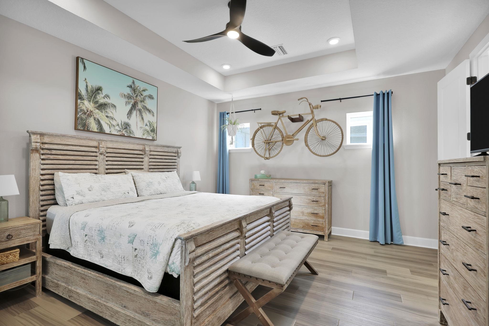 32 Martha Ct. St. Augustine, FL 32092 - Photo 13 of 36 a bedroom with a bed and a chandelier