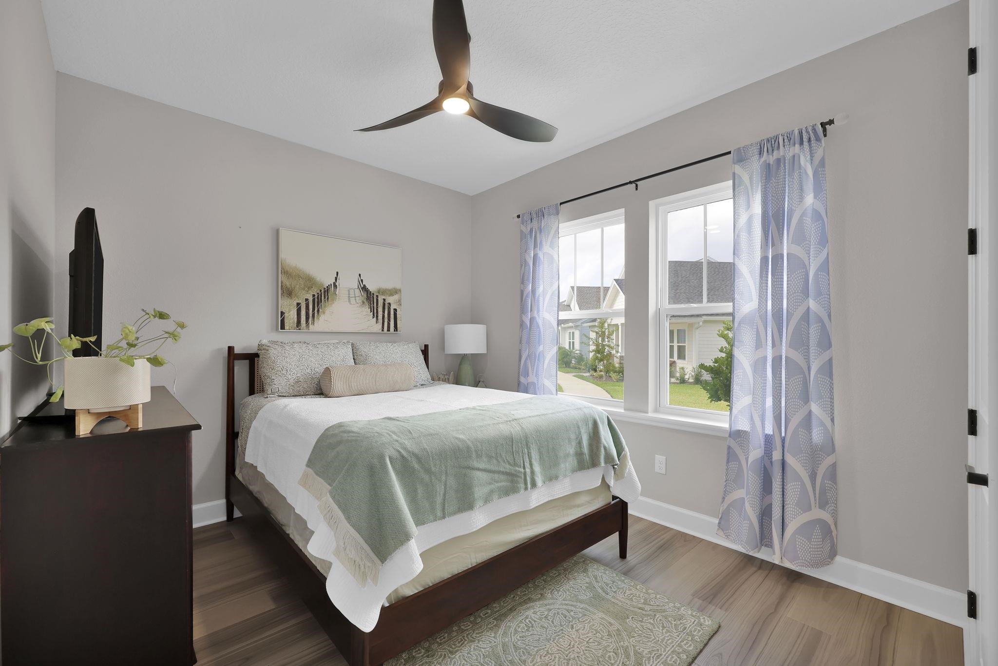 32 Martha Ct. St. Augustine, FL 32092 - Photo 17 of 36 a bedroom with a bed and a window