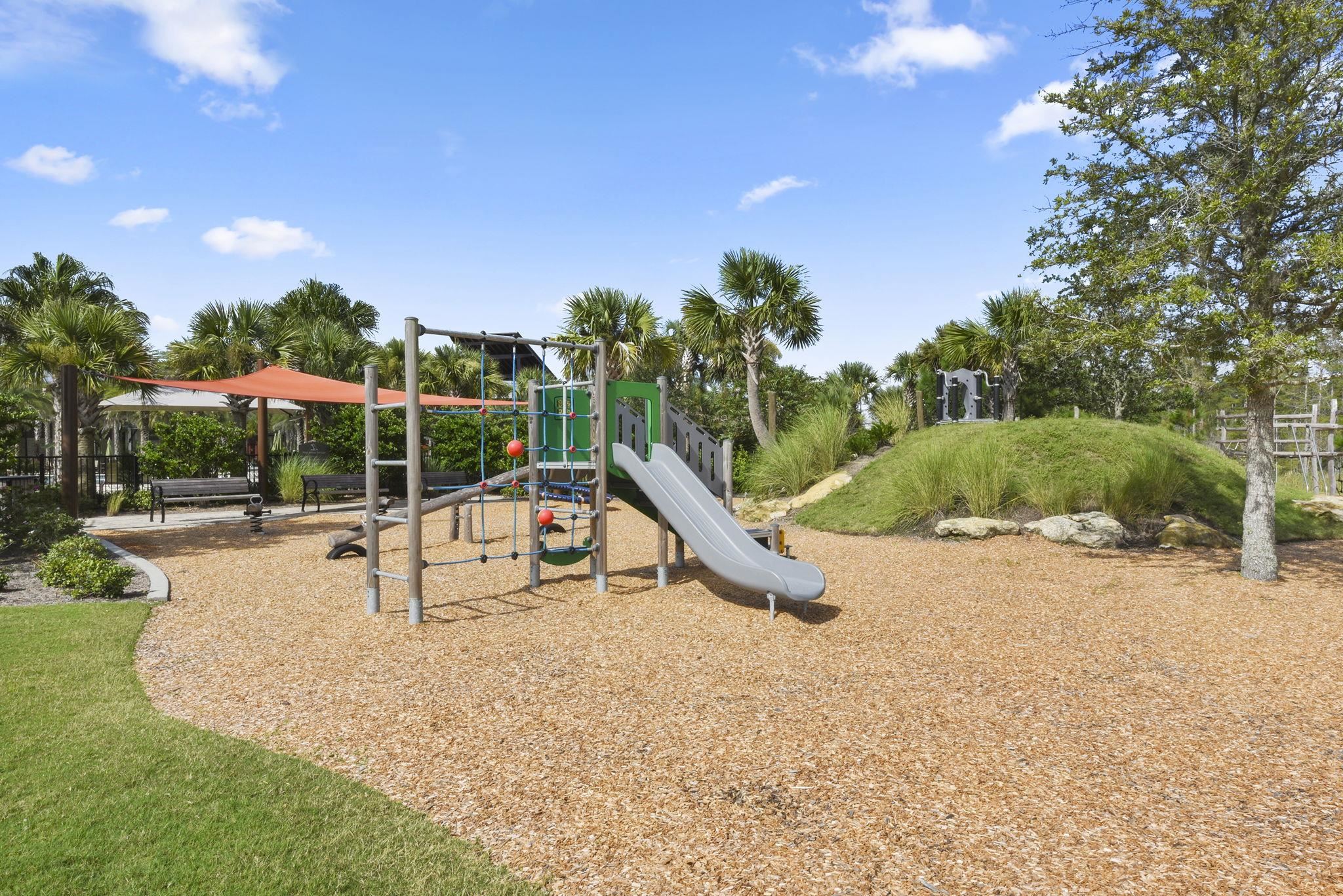 32 Martha Ct. St. Augustine, FL 32092 - Photo 32 of 36 a view of a park with swings and slides