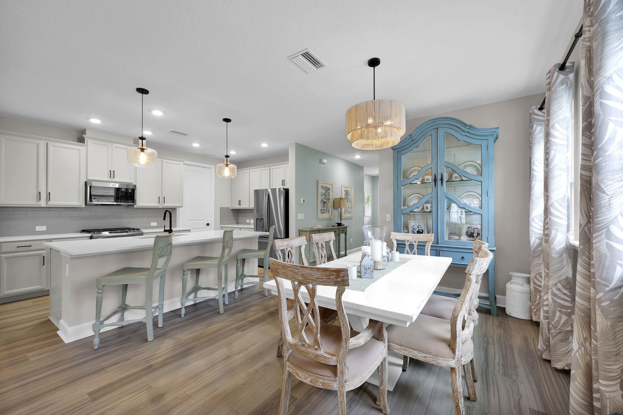 32 Martha Ct. St. Augustine, FL 32092 - Photo 7 of 36 a large kitchen with a table and chairs