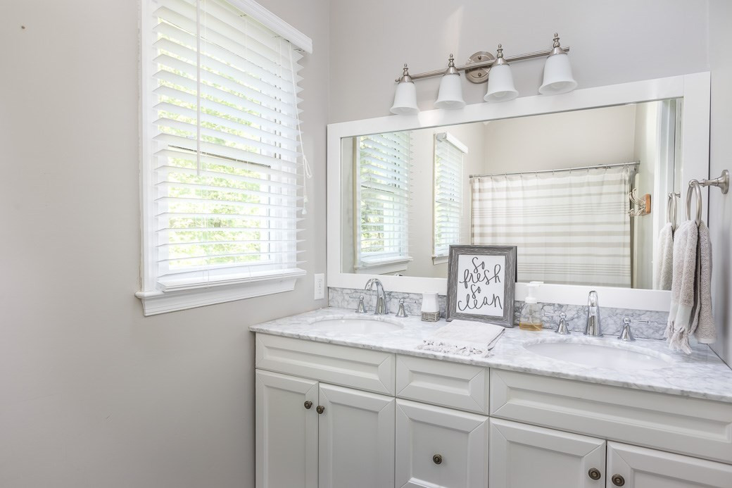 3 Hitching Rack Court Durham, NC 27713 - Photo 6 of 9 Bright and clean, totally RENOVATED Master Bathroom comes complete with New DUAL sinks, New mirror, New fixtures and New flooring! Master Bathroom