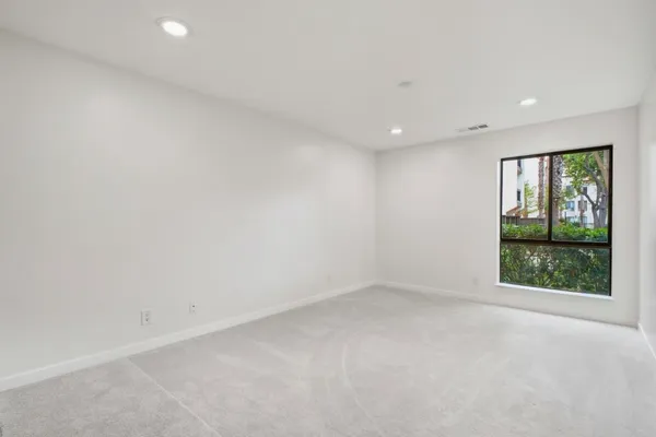 an empty room with windows