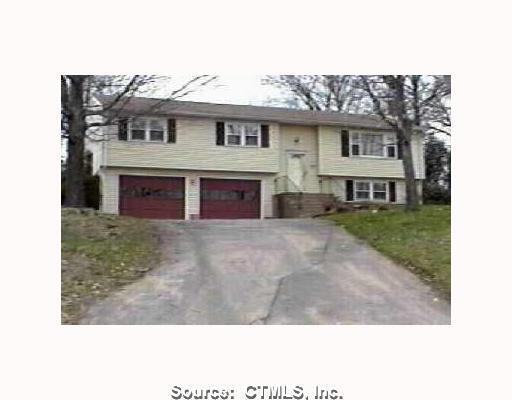 723 Nevers Road South Windsor, CT 06074 - Photo 1 of 1 a view of a big house with a big yard and large tree