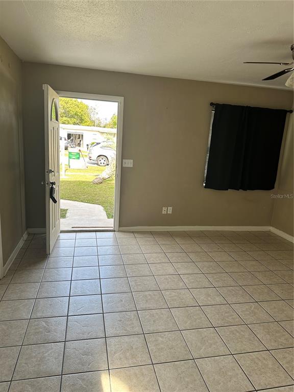 2302 Idaho Road Deltona, FL 32738 - Photo 12 of 22 a view of an empty room and window