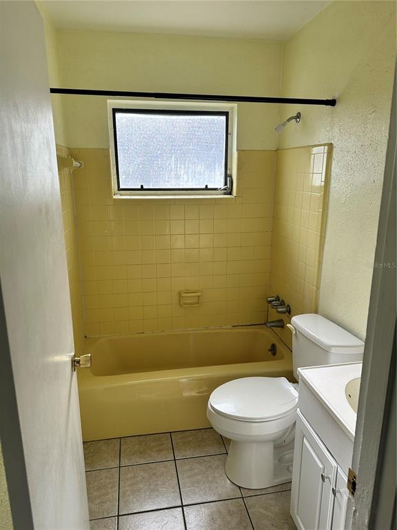 2302 Idaho Road Deltona, FL 32738 - Photo 15 of 22 a bathroom with a toilet and a shower