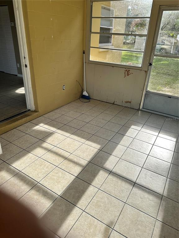 2302 Idaho Road Deltona, FL 32738 - Photo 17 of 22 a view of an empty room with a window