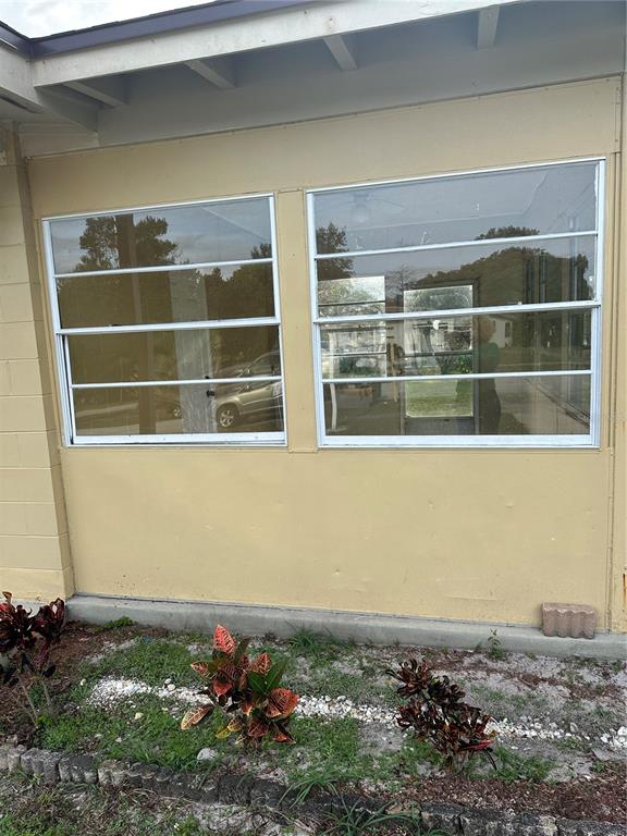 2302 Idaho Road Deltona, FL 32738 - Photo 19 of 22 a view of a house with a window
