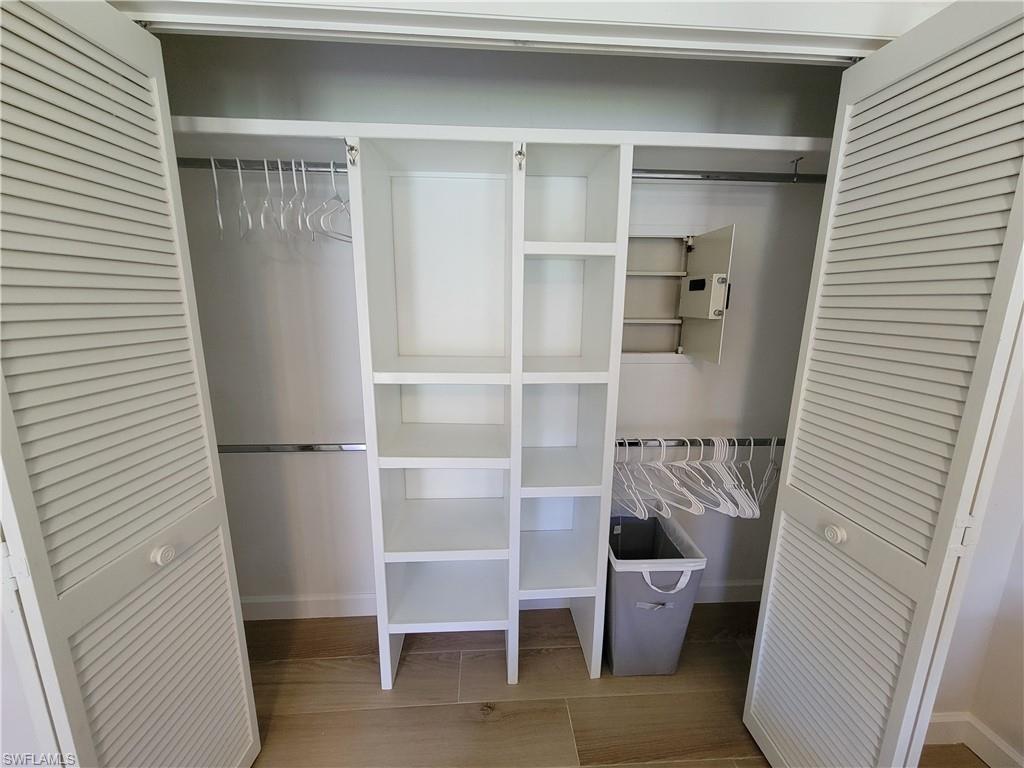 809 Palm View Drive, Unit 8 Naples, FL 34110 - Photo 16 of 26 a view of a walk in closet