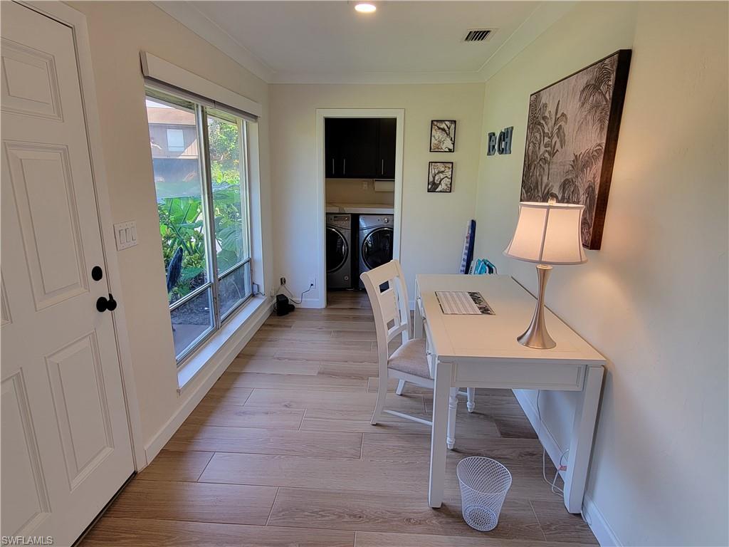 809 Palm View Drive, Unit 8 Naples, FL 34110 - Photo 23 of 26 a workspace with furniture and window